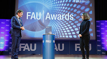 FAU Awards: Prof. Hornegger and Silvia Viola Kusminskiy